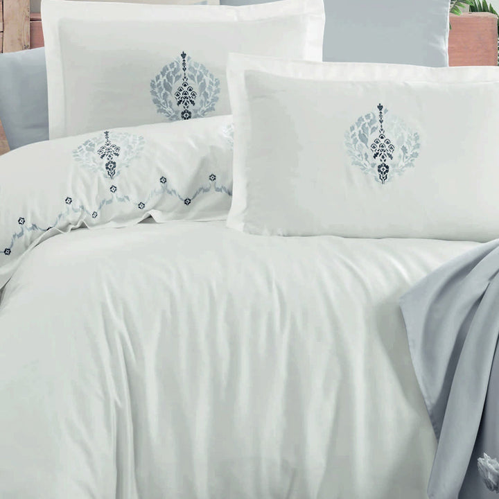 Close-up of Elegant Floral Patterns on Cotton Bed Linen Set in Ecru Color – Adds a Stylish Touch to Your Bedroom