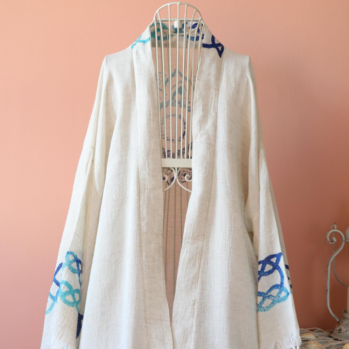 Linen-cotton blend, hand-made kimono has modern, blue designs on it