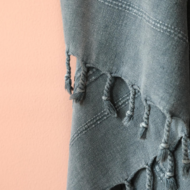 Dark-grey peshtemal towel has hand-tied tassels